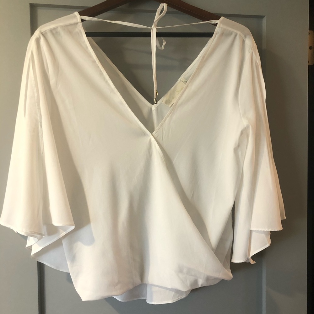 Like new! Anthropology white flowy top